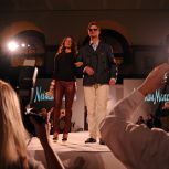 Kyle and Stephenie Kendrick pose for photos on the runway.