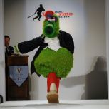 The Phanatic head down the runway.